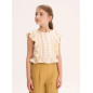 Blusa de niña blanca con estampado mostaza y volantes laterales-Dadati